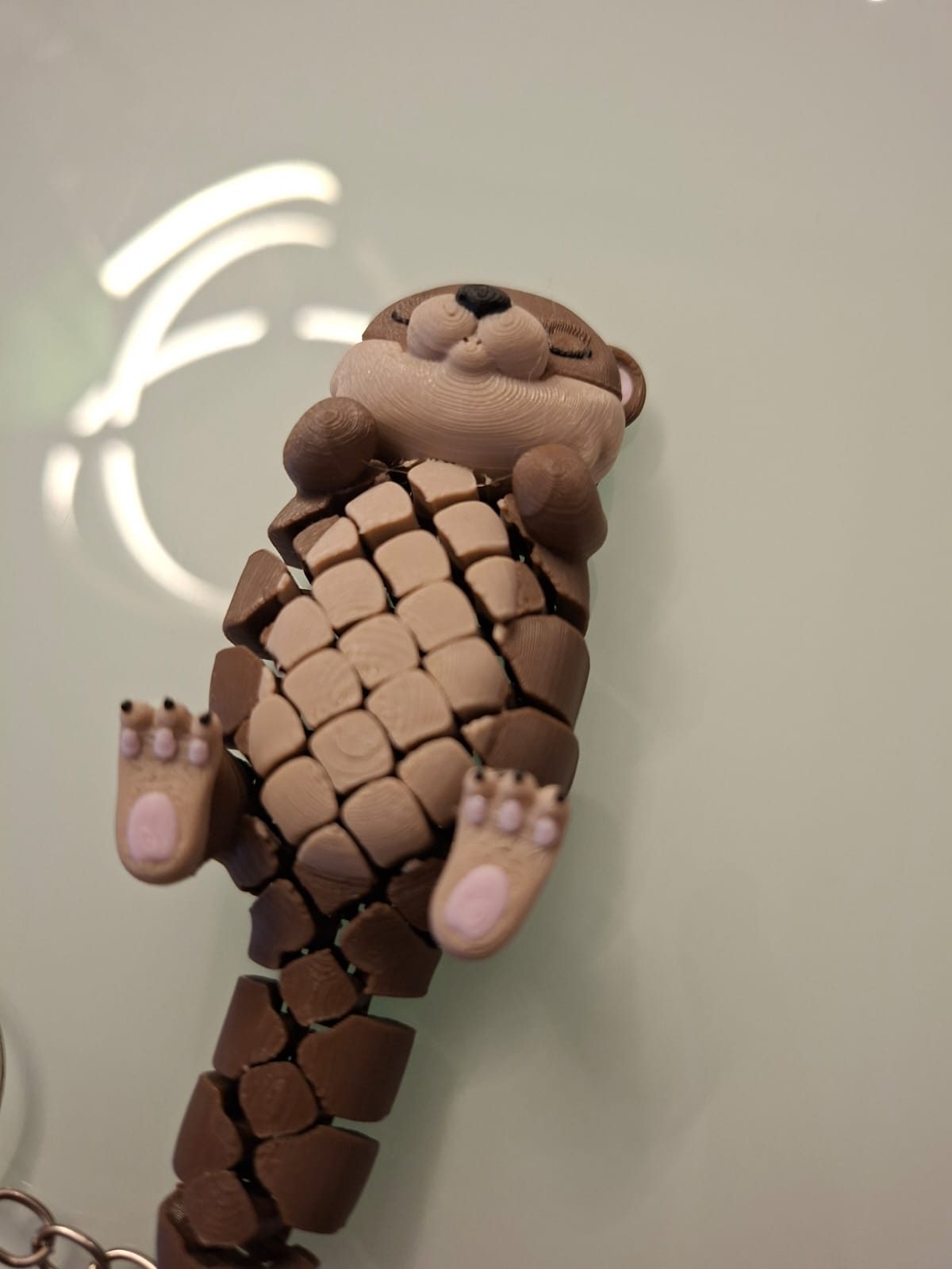 Chaveiro Sensorial Lontra 3D Articulada – 10 cm